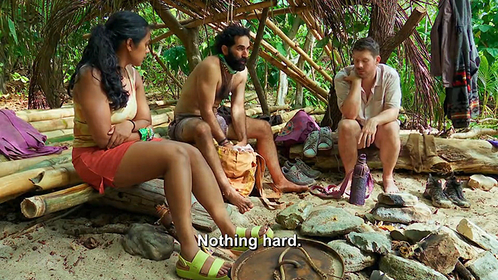 Shauhin searching Kyle's bag