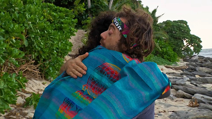 Christian and Ozzy hug