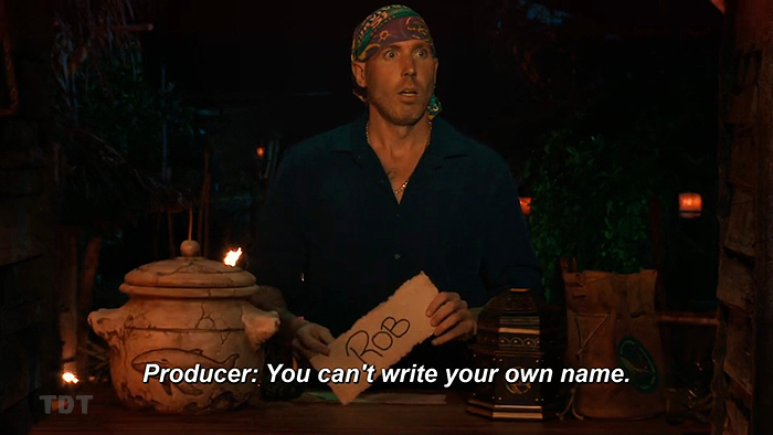Producer telling Rob: You can't write your own name Producer telling Rob: You can't write your own name